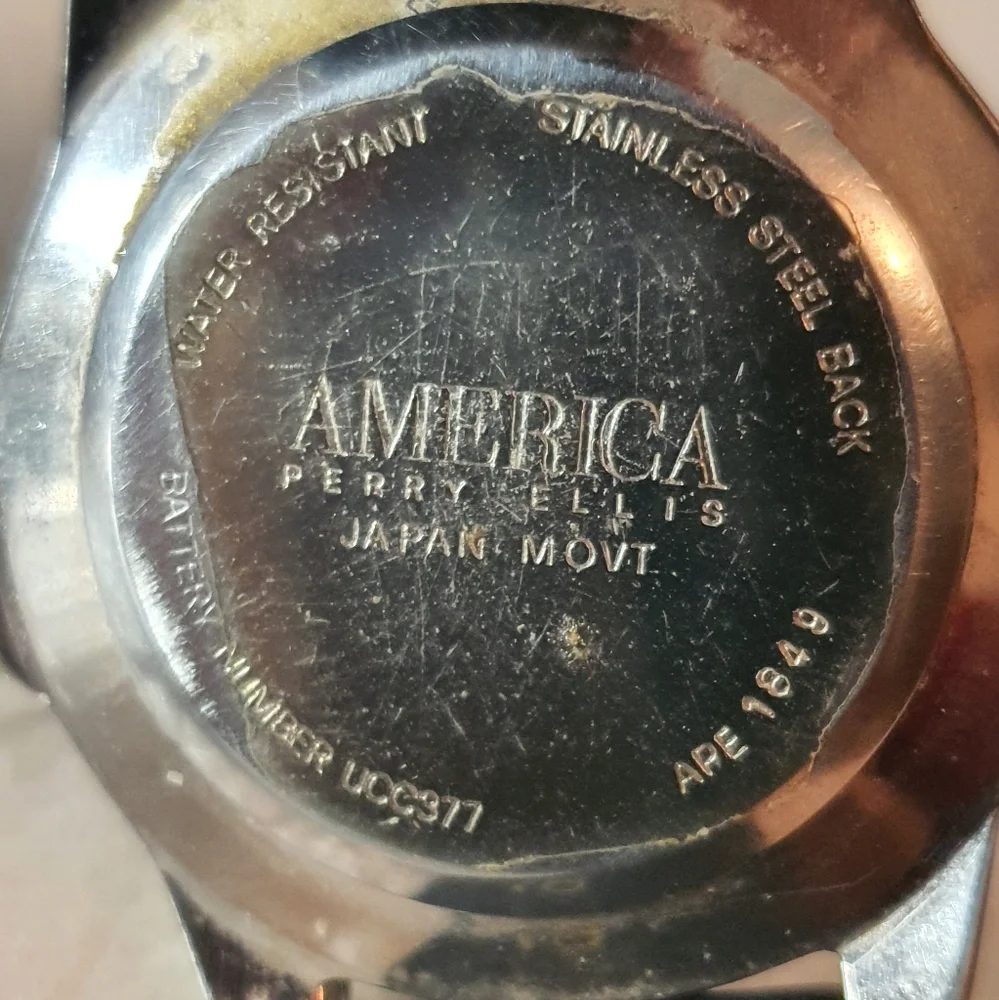 10/$20 Vintage America Perry Ellis Silver/Blue Leather Men's Watch